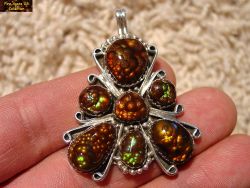 Small Picture 2 DCJ001 Stunning sterling silver fire agate pendant containing seven gem quality fire agates