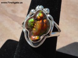 Small Picture 2 DCJ004 Colorful fire agate ring being displayed on ring holder
