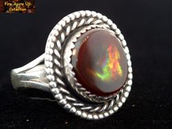 Small Picture 2 DCJ004 Calvillo Mexico fire agate gem set in sterling silver ring with a bright flash of fire being displayed