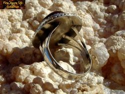 Small Picture 3 DCJ004 Silver ring band and side view of ring set on coral background